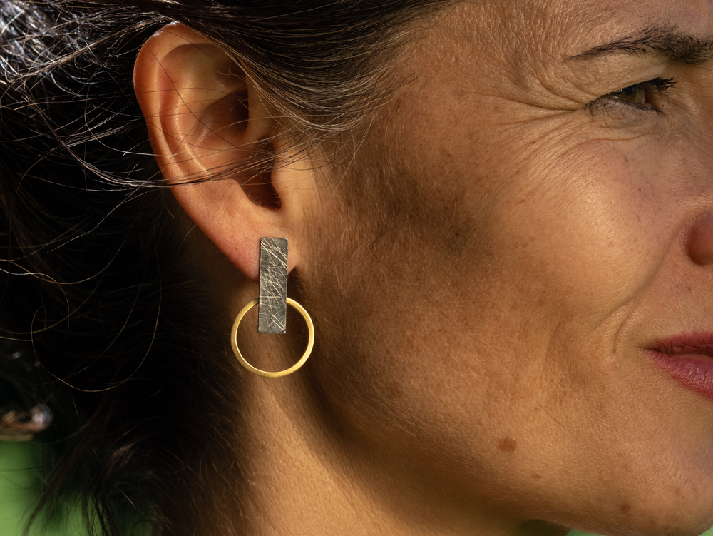 Totem urre belarritakoak